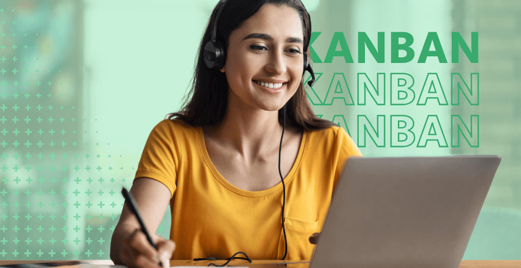 Person working at a computer with the word Kanban in the background